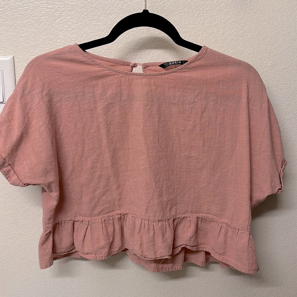 Loose fitting blouse.